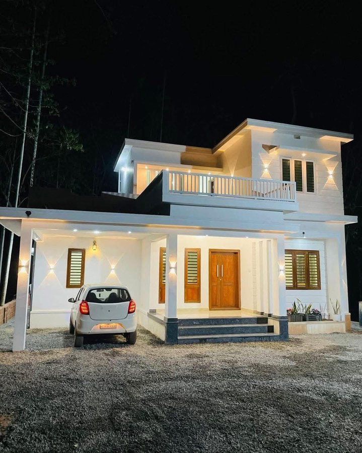 Cost-Effective Dual-Story Gated Villa with Linear Illumination